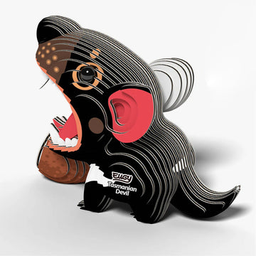 Toy model of a Tasmanian Devil with an open mouth on a white background.