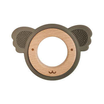 Wooden teething ring with koala face design on a white background.