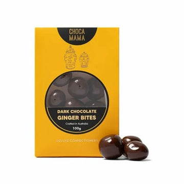 A yellow box with a window showing dark chocolate ginger bites inside.