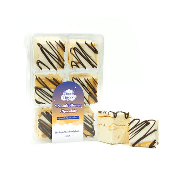 A packet of six peanut butter and chocolate flavoured marshmallows with two marshmallows next to the packet.