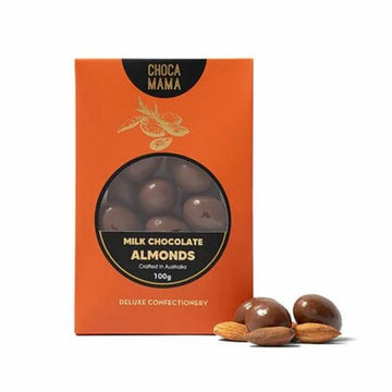 An orange box with a window showing chocolate covered almonds inside.