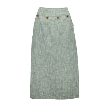 A linen skirt in light green with four buttons along the top.
