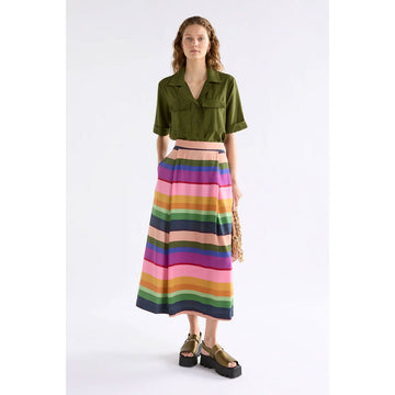 Colorful striped skirt on a light gray background.