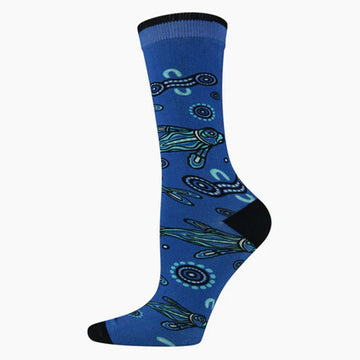 A blue sock with a black heel and toe and illustrated with seals.