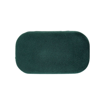 A small hard shell case in green velvet.
