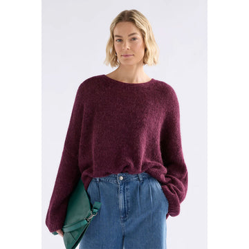 Maroon sweater on a white background.