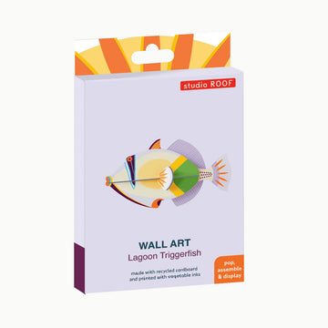 Colorful fish-shaped 3D coloured cardboard model on a white background.