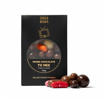 A black box with a cut out window showing chocolate covered lollies inside.