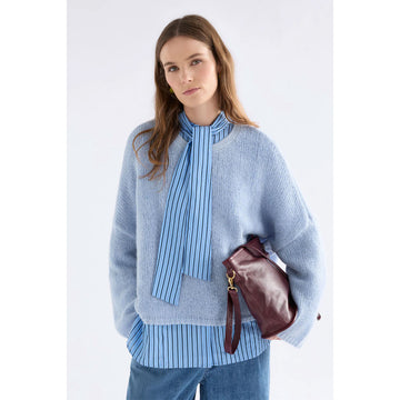 Light blue sweater on a white background.