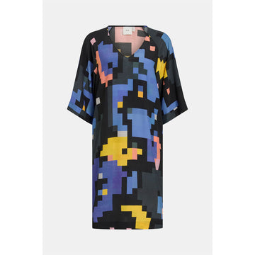 Colorful abstract patterned dress on a white background.