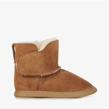 Side view of a baby sized ugg boot in chestnut brown with a velcro strap.
