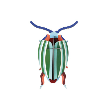 Colorful beetle 3D coloured cardboard model on a white background.