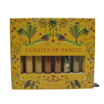 Box of 'Curries of Origin' with decorative design on a yellow background with test tubes filled with curries inside.