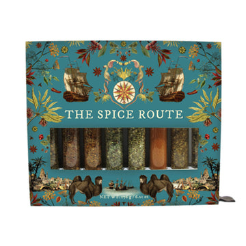 A boxed set of spices titled 'The Spice Route' and test tubes filled with spices inside.