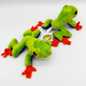 Two frog soft toys pictured showing two different angles.