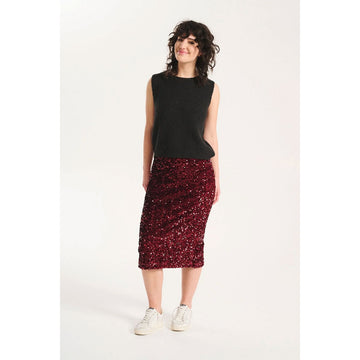 A pencil style skirt covered with red sequins.