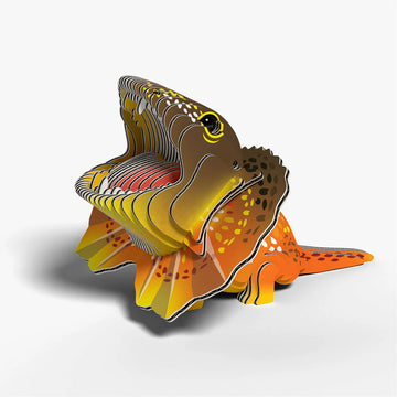 3D cardboard model of a frilled lizard on a white background.