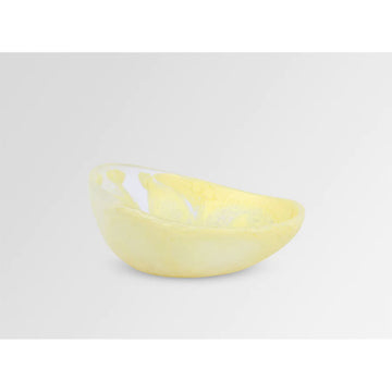 A desert bowl made from resin with yellow and white swirls.