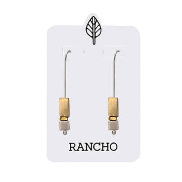 Pair of gold and silver earrings on a Rancho branded card.