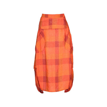 An orange skirt with a checkered pattern and side pockets.