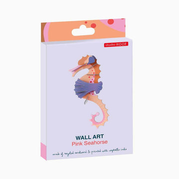 Colorful seahorse-shaped 3D carboard model on a white background.