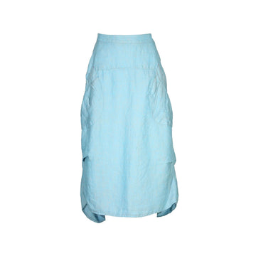 A light blue linen skirt with side pockets.
