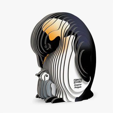 3D cardboard model of an emperor penguin with a black and white design on a white background.