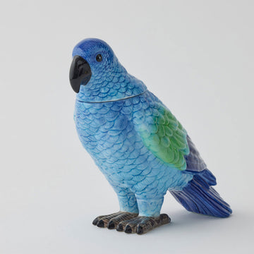 A ceramic jar shaped like a bird in blue.