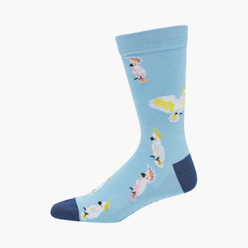 A sky blue sock with a dark blue heel and toe and illustrated with cockatoos.