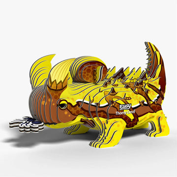 Cardboard model of a thorny devil lizard with a yellow and brown color scheme on a white background.