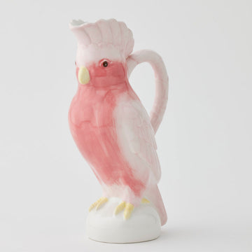 A ceramic jar shaped like a pink galah bird.