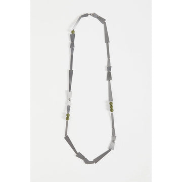 A gunmetal grey necklace with long triangular shapes and round beads on the necklace.