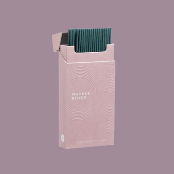 A light pink box titled 'Maho Wander Bloom' against a purple background.