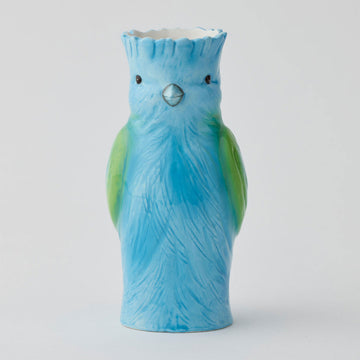A ceramic vase shaped like a blue and green bird.