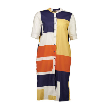 Front view of a shirt dress with an abstract geometric pattern in orange, navy, white and yellow.
