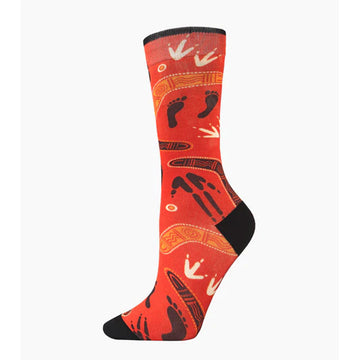 A red sock illustrated with Aboriginal artwork of footprints and boomerangs.