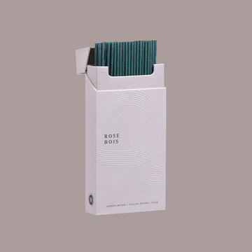 A light pink box titled 'Maho Rose Bois' against a purple grey background.