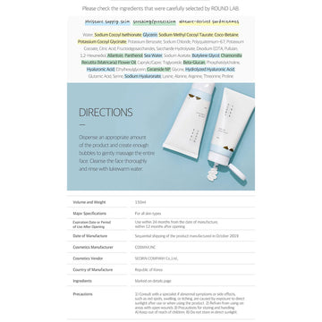 A clear tube with a blue label and product information.