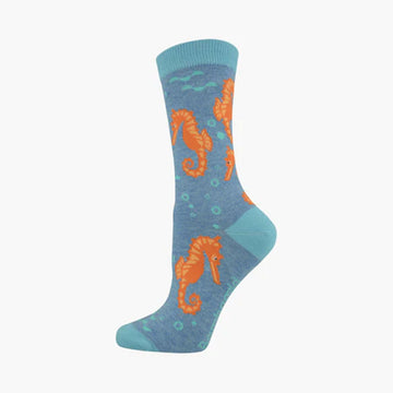 A blue sock illustrated with orange seahorses.