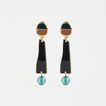 A pair of drop earrings with a green and brown top, black bar and blue green bead at the bottom.