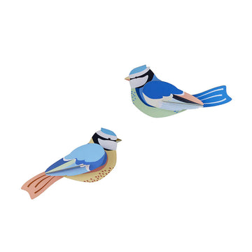Two blue birds wall art made from cardboard.