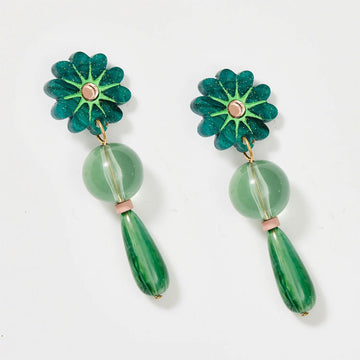 A pair of drop earrings in green with a flower at the top followed by a round bead and tear drop bead.