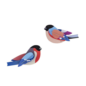 Two wall art birds made from carboard.