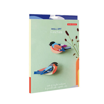 Two wall art birds made from carboard.