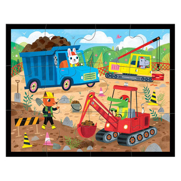 Pouch puzzle packaging with construction site theme and colorful illustration of vehicles and workers.