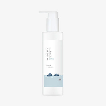 Skincare bottle with blue liquid on a white background.