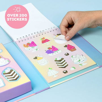 Packaging of 'Dreamy Desserts stacks of stickers' with scented feature, featuring cartoon illustrations on a pink background.