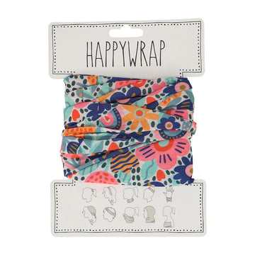 A floral fabric folded up around a white card with the heading 'Happywrap' at the top and a picture of 10 different ways to wear the happy wrap at teh bottom.