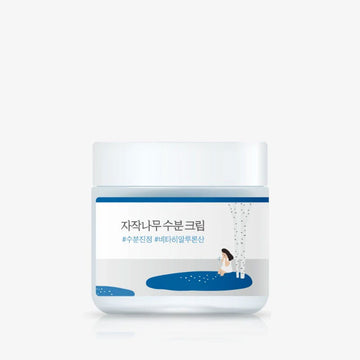Skincare cream jar with a design on a white background.
