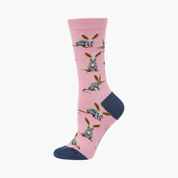 Pink sock with bilby pattern on a white background.